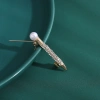 Factory direct sales, creative and light luxury new best-selling retro water diamond pen, stainless steel brooch, anti-glare, light luxury creative retro brooch, simple and fashionable accessory pin Application Scenario